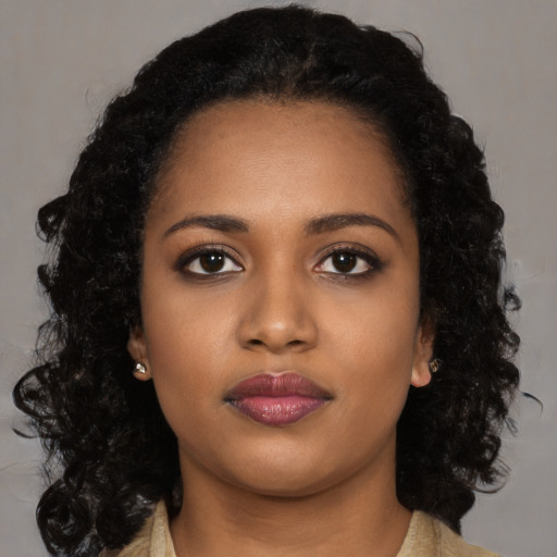Neutral black young-adult female with long  black hair and brown eyes