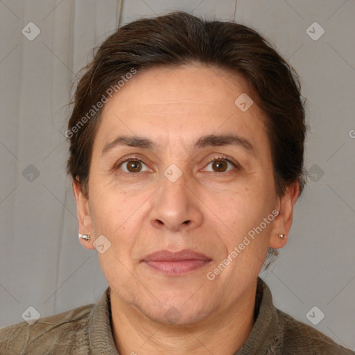 Joyful white adult female with short  brown hair and brown eyes