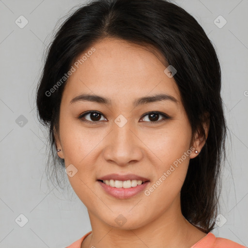 Joyful asian young-adult female with medium  brown hair and brown eyes