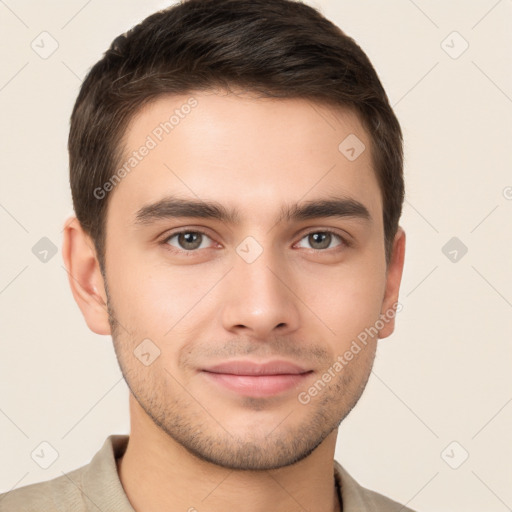 Joyful white young-adult male with short  brown hair and brown eyes