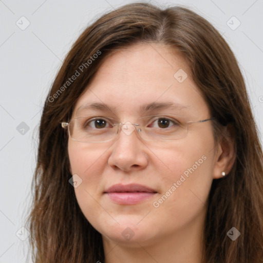 Joyful white adult female with long  brown hair and brown eyes