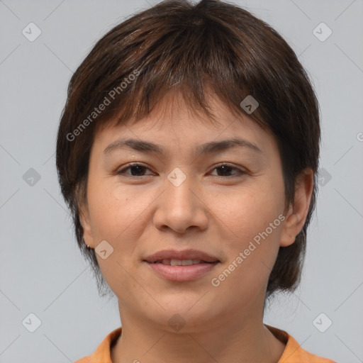 Joyful asian young-adult female with short  brown hair and brown eyes