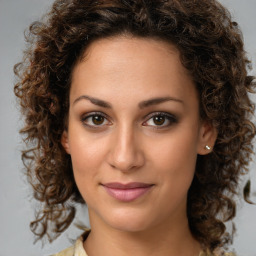 Joyful white young-adult female with medium  brown hair and brown eyes