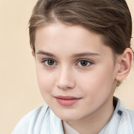 Joyful white child female with short  brown hair and brown eyes