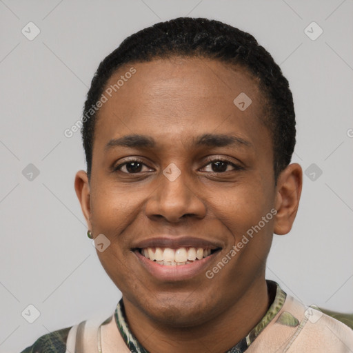 Joyful black young-adult male with short  black hair and brown eyes