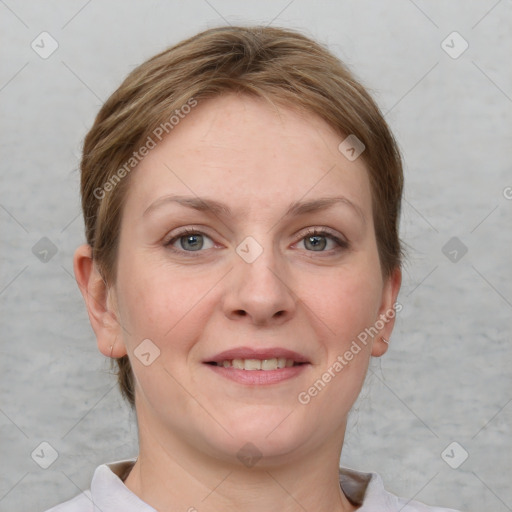 Joyful white young-adult female with short  brown hair and grey eyes