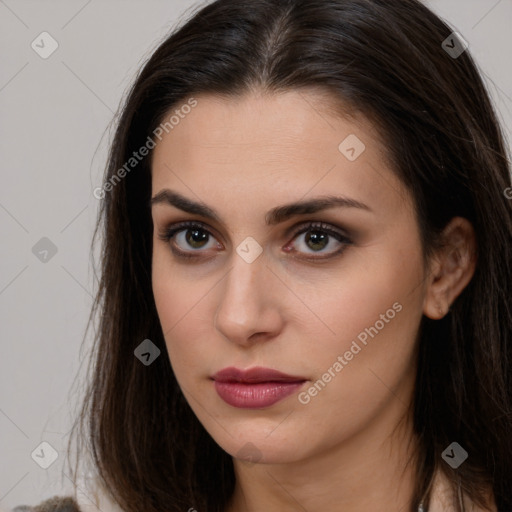 Neutral white young-adult female with long  brown hair and brown eyes