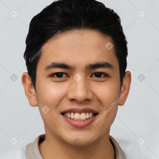 Joyful latino young-adult male with short  brown hair and brown eyes