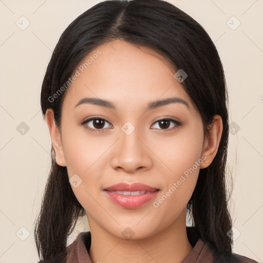 Joyful white young-adult female with long  black hair and brown eyes