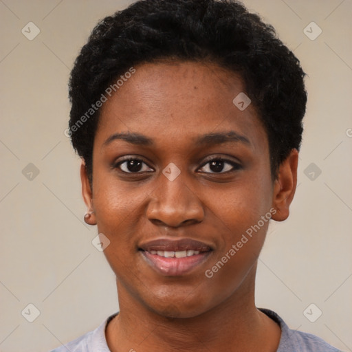 Joyful black young-adult female with short  black hair and brown eyes