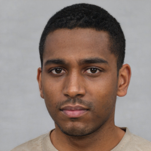 Neutral black young-adult male with short  black hair and brown eyes