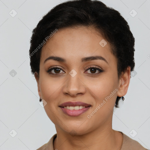 Joyful latino young-adult female with short  brown hair and brown eyes