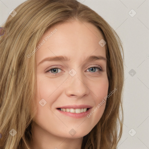 Joyful white young-adult female with long  brown hair and blue eyes