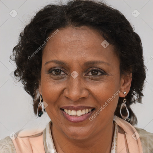 Joyful black adult female with short  brown hair and brown eyes