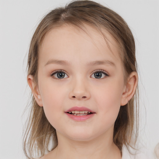 Joyful white child female with medium  brown hair and blue eyes