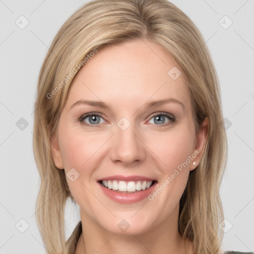 Joyful white young-adult female with long  brown hair and grey eyes