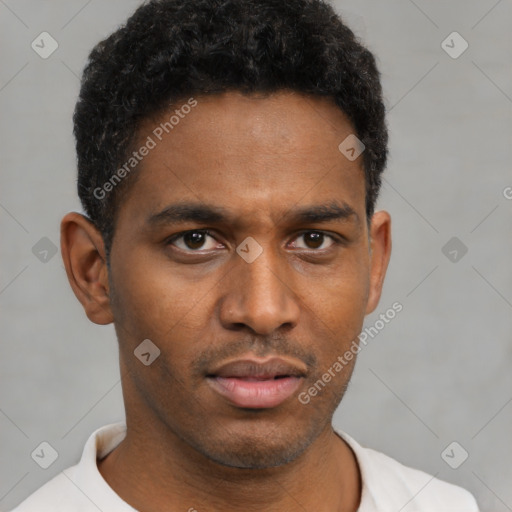 Neutral black young-adult male with short  brown hair and brown eyes