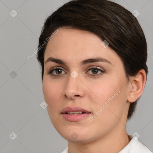 Joyful white young-adult female with medium  brown hair and brown eyes