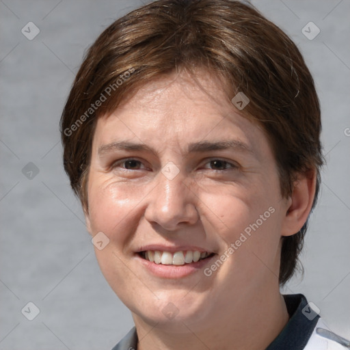 Joyful white adult female with medium  brown hair and brown eyes