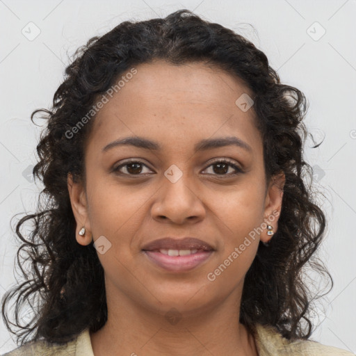 Joyful black young-adult female with long  brown hair and brown eyes