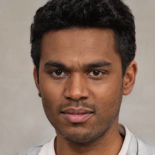 Neutral latino young-adult male with short  black hair and brown eyes