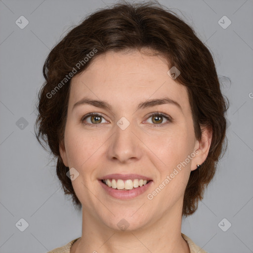 Joyful white young-adult female with medium  brown hair and green eyes