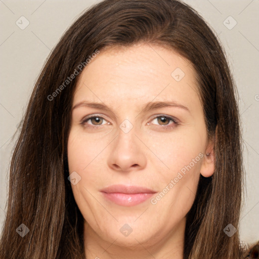 Joyful white adult female with long  brown hair and brown eyes