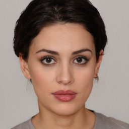 Neutral white young-adult female with short  brown hair and brown eyes