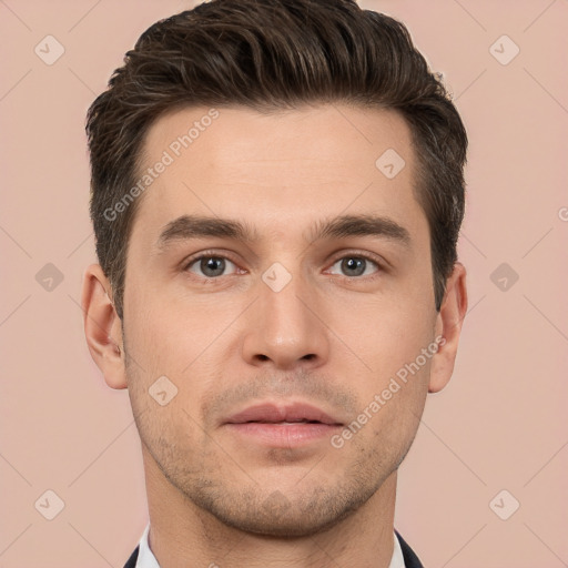 Neutral white young-adult male with short  brown hair and brown eyes