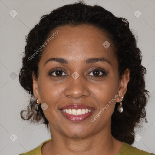 Joyful black young-adult female with medium  brown hair and brown eyes