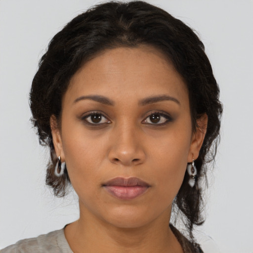 Neutral latino young-adult female with long  brown hair and brown eyes