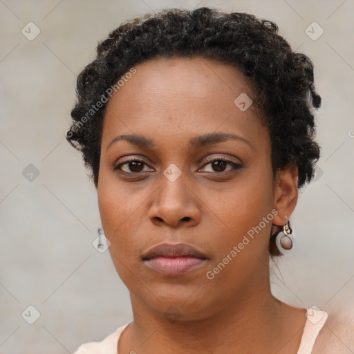 Neutral black young-adult female with short  brown hair and brown eyes