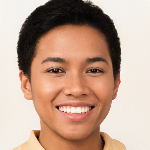 Joyful latino young-adult male with short  brown hair and brown eyes