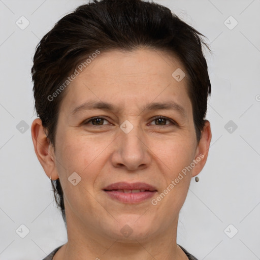 Joyful white adult female with short  brown hair and brown eyes