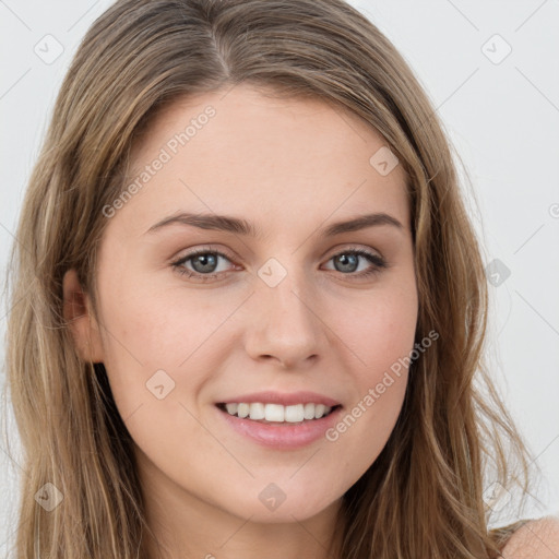 Joyful white young-adult female with long  brown hair and green eyes