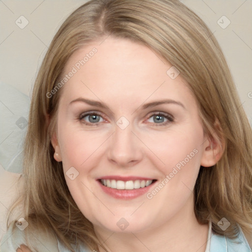 Joyful white young-adult female with medium  brown hair and blue eyes