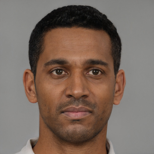 Neutral black young-adult male with short  black hair and brown eyes