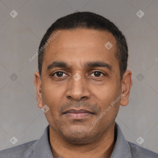 Neutral white adult male with short  black hair and brown eyes