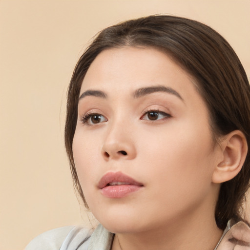 Neutral white young-adult female with medium  brown hair and brown eyes