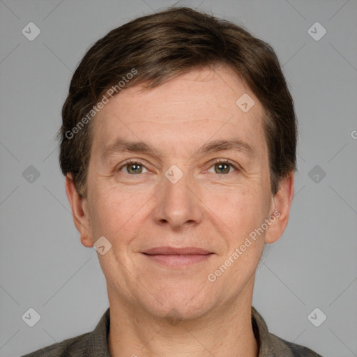 Joyful white adult male with short  brown hair and grey eyes