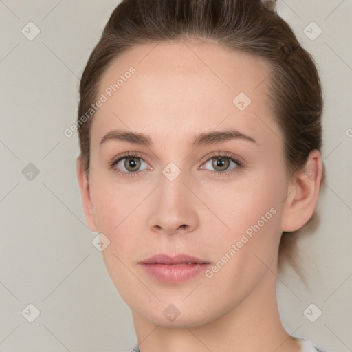 Neutral white young-adult female with short  brown hair and grey eyes