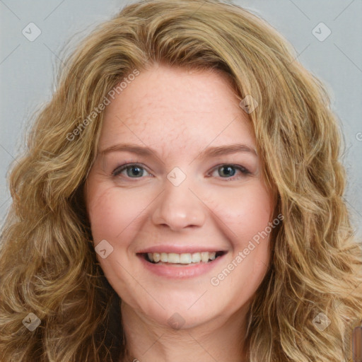 Joyful white young-adult female with long  brown hair and green eyes