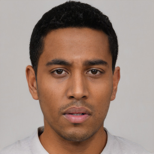 Neutral black young-adult male with short  black hair and brown eyes