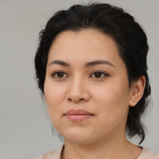 Neutral asian young-adult female with medium  brown hair and brown eyes