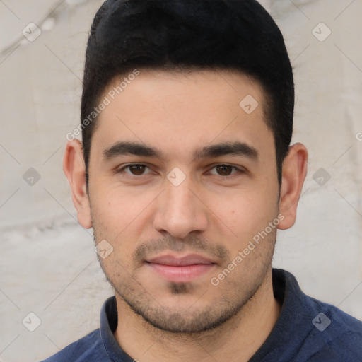 Joyful white young-adult male with short  black hair and brown eyes