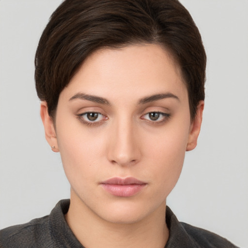 Neutral white young-adult female with short  brown hair and brown eyes