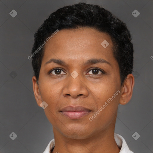 Joyful black adult female with short  brown hair and brown eyes