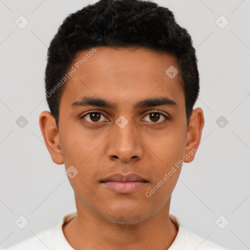 Neutral latino young-adult male with short  black hair and brown eyes