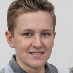 Joyful white adult female with short  brown hair and grey eyes