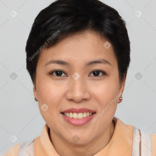 Joyful asian young-adult female with short  brown hair and brown eyes